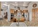 Well-appointed kitchen with stainless steel appliances, granite countertops, a kitchen island, and stylish pendant lighting at 2641 E Birchwood Pl, Chandler, AZ 85249