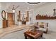 Stylish living room featuring high ceilings, unique design elements, and an open floor plan at 2641 E Birchwood Pl, Chandler, AZ 85249