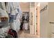 Well-organized walk-in closet with ample storage for clothing and accessories at 2641 E Birchwood Pl, Chandler, AZ 85249