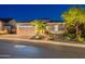 Charming single-story home featuring a well-maintained yard and two-car garage at 26879 N 100Th Ln, Peoria, AZ 85383