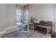 Comfortable office space with a workstation and storage at 26879 N 100Th Ln, Peoria, AZ 85383