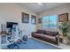 Comfortable home office featuring a modern desk and stylish decor at 26879 N 100Th Ln, Peoria, AZ 85383