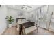 Comfortable bedroom featuring a ceiling fan and natural light through a window at 27636 W Runion Dr, Buckeye, AZ 85396