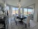 Dining room with a table, six chairs, and natural lighting at 27636 W Runion Dr, Buckeye, AZ 85396