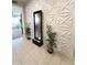Inviting entryway features a modern accent wall with a water feature at 27636 W Runion Dr, Buckeye, AZ 85396