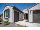 Charming single-story home with desert landscaping, two car garage and cozy courtyard entrance at 27636 W Runion Dr, Buckeye, AZ 85396