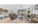 Open living room with modern furnishings, creating a comfortable gathering space at 27636 W Runion Dr, Buckeye, AZ 85396