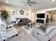 Spacious living room with comfortable seating and modern decor at 27636 W Runion Dr, Buckeye, AZ 85396