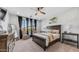 Serene main bedroom featuring a ceiling fan and a full view of the outdoor space at 27636 W Runion Dr, Buckeye, AZ 85396