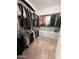 Walk-in closet with ample storage and organization solutions for clothes and accessories at 27636 W Runion Dr, Buckeye, AZ 85396