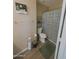 Bathroom with a toilet and shower including neutral walls and flooring at 284 W Settlers Trl, Casa Grande, AZ 85122