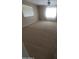 Spacious bedroom features neutral carpet, ample light and a ceiling fan at 284 W Settlers Trl, Casa Grande, AZ 85122