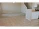 Spacious living room featuring carpet, neutral walls, and a staircase leading to the upper level at 284 W Settlers Trl, Casa Grande, AZ 85122