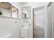 Bright bathroom featuring a white vanity and sink, a mirror, and a view to a bedroom at 2913 E Earll Dr, Phoenix, AZ 85016