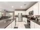 Kitchen view highlighting the open floor plan and stainless steel appliances at 37008 N Hinterwald Way, San Tan Valley, AZ 85143