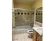 Clean bathroom with shower-tub combo with tiled walls, neutral walls and a single vanity at 4107 E Bloomfield Rd, Phoenix, AZ 85032