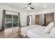Bedroom featuring a sliding glass door, barn door closet, and sleek modern design at 4205 N 19Th Pl, Phoenix, AZ 85016