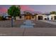 Inviting home with concrete stepping stones leading to the front door and a detached garage at 4205 N 19Th Pl, Phoenix, AZ 85016