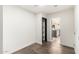 Hallway leading to a kitchen with updated appliances and a view of the backyard at 4205 N 19Th Pl, Phoenix, AZ 85016