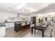 Modern kitchen featuring a large island, skylights, sleek countertops, and stainless steel appliances at 4205 N 19Th Pl, Phoenix, AZ 85016