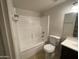 Neat bathroom with a shower-tub combination and a vanity at 4714 E Pueblo Ave, Phoenix, AZ 85040