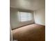Cozy bedroom featuring a window that provides natural light at 4714 E Pueblo Ave, Phoenix, AZ 85040