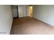 Bedroom with sliding closet doors, offering plenty of storage at 4714 E Pueblo Ave, Phoenix, AZ 85040