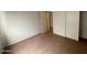 Neutral bedroom with a large closet providing ample storage space at 4714 E Pueblo Ave, Phoenix, AZ 85040