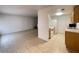 Bright living area with tile flooring leading into an open kitchen space at 4714 E Pueblo Ave, Phoenix, AZ 85040