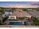 An aerial view of a home featuring a backyard with a swimming pool and patio area at 5122 S Miller Pl, Chandler, AZ 85249