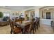 Elegant dining room with hardwood table, decorative details, and ample seating at 5122 S Miller Pl, Chandler, AZ 85249