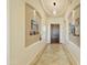 Spacious foyer with tile flooring, decorative lighting, and views into the living spaces at 5122 S Miller Pl, Chandler, AZ 85249