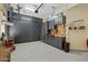 Spacious garage with lots of storage, tool bench and epoxy flooring at 5122 S Miller Pl, Chandler, AZ 85249