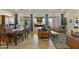 Bright living room featuring a dining area, large windows, and stylish decor at 5122 S Miller Pl, Chandler, AZ 85249