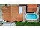 Aerial view of a charming home with a private backyard pool, red tile roof, and brick patio at 541 W Vernon Ave, Phoenix, AZ 85003