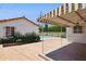 Backyard view showcasing covered patio, pool, and lush landscaping at 541 W Vernon Ave, Phoenix, AZ 85003