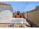 Spacious backyard featuring a brick patio, built-in barbecue, and a seating area at 541 W Vernon Ave, Phoenix, AZ 85003