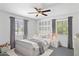 Comfortable ' bedroom with ample natural light, stylish decor, and whimsical artwork at 541 W Vernon Ave, Phoenix, AZ 85003
