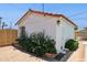 Charming exterior with a red tile roof, brick accents, and decorative lighting at 541 W Vernon Ave, Phoenix, AZ 85003