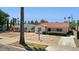 Quaint homes with drought-resistant landscaping and orange tile roofs line the street in this residential neighborhood at 541 W Vernon Ave, Phoenix, AZ 85003