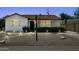 Lovely home with desert landscaping, landscape lighting and traditional clay tile roofing at 541 W Vernon Ave, Phoenix, AZ 85003