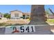 Charming home with desert landscaping and palm tree near the curb displaying address number at 541 W Vernon Ave, Phoenix, AZ 85003