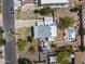 Aerial view showcasing the property's layout, including the pool, patio area, and surrounding landscape at 55 E Pierson St, Phoenix, AZ 85012