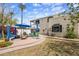 Expansive backyard with mature trees, patio seating, and well-maintained landscaping at 55 E Pierson St, Phoenix, AZ 85012