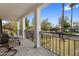 Spacious balcony with wrought iron railing and views of lush greenery at 55 E Pierson St, Phoenix, AZ 85012