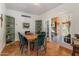 Inviting dining room with hardwood floors, modern chairs, and an open layout at 55 E Pierson St, Phoenix, AZ 85012