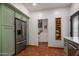 Kitchen with stainless steel fridge and convenient spice rack at 55 E Pierson St, Phoenix, AZ 85012
