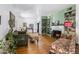 Cozy living room featuring hardwood floors, fireplace and built-in bookcase at 55 E Pierson St, Phoenix, AZ 85012