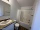 Bathroom with neutral colored walls, tile floors, and bath/shower combo at 625 W Mckellips Rd # 236, Mesa, AZ 85201