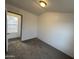 Bedroom featuring carpeted floors, neutral paint, and window with blinds at 625 W Mckellips Rd # 236, Mesa, AZ 85201